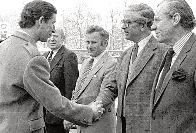 Macvicar, as the Chairman of Governors of Dean Orphanage and Cauvin's Trust, greeting a young Prince Charles