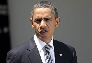 President Barack Obama speaks in the Rose Garden after the bill was passed