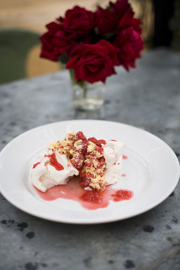 Meringue with sweet cream and raspberries