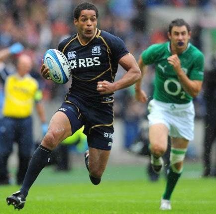 Joe way back: Scotland's Joe Ansbro races away from the Ireland defence to score the only try of the match