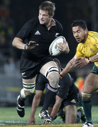 Captain marvel: Richie McCaw leads the charge for New Zealand in Auckland