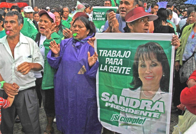 Sandra Torres addresses supporters of her National Unity of Hope Party outside the constitutional court, which ruled her divorce was no more than a political ploy