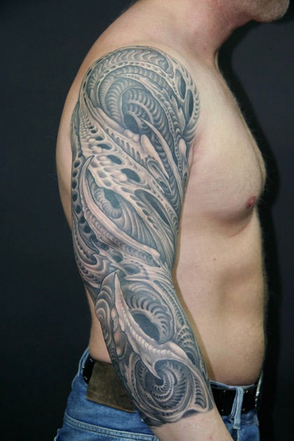 Shoulder to forearm tattoo by Louis Molloy