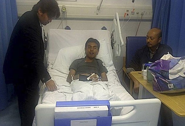 Ashraf Rossli was seen bleeding after being punched in the jaw less than a month after arriving in Britain