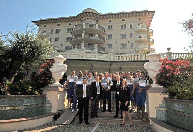 Me and my Queen's Park Rangers players celebrate our first trophy of the season on tour in Italy last month