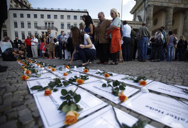 Floral tributes to people killed trying to cross to West Berlin