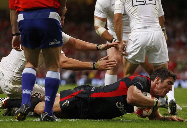 James Hook, the Wales full-back who moved up to fly-half, scores the only try in Cardiff