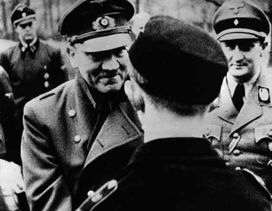 The Führer's last official photo, presenting decorations to Hitler Youth members in Berlin