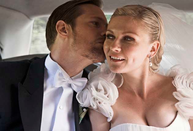 Whisper It: Kirsten Dunst plays a bride-to-be alongside Alexander Skarsgard in Melancholia