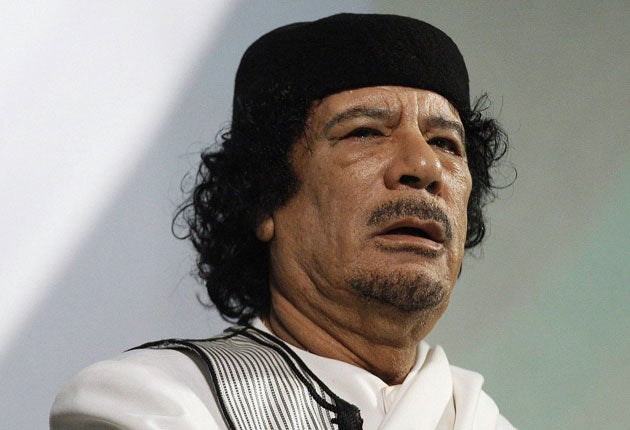 Muammar Gaddafi denies rumours that he has fled Libya