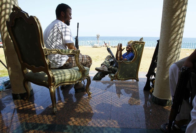 Libyan rebels from Misrata resting in a camp set up in Gaddafi's wife's abandoned summer home in Tripoli