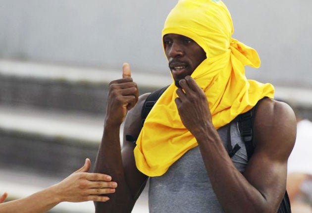 Bolt during a training session in Daegu following his disqualification from the 100m final