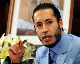 Saadi is trying to negotiate the terms of his own surrender, say Libyan rebels