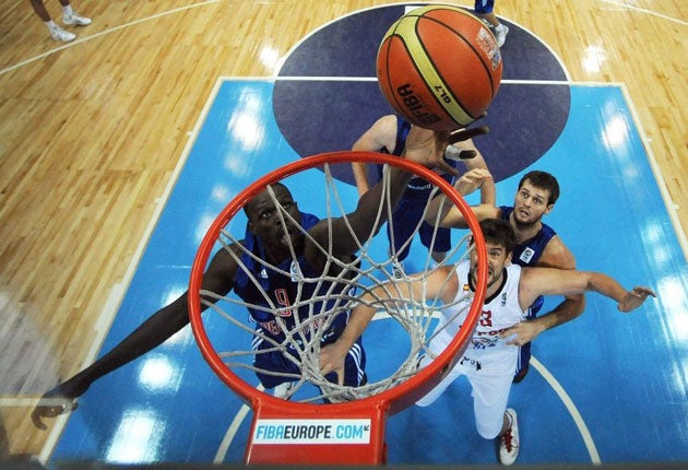 Luol Deng (scoring above) scored 17 points for Britain, and Pau Gasol 21 for Spain