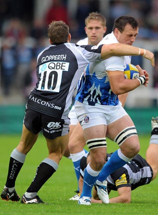 Bath's Carl Fearns tries to run through Jimmy Gopperth’s tackle at Kingston Park