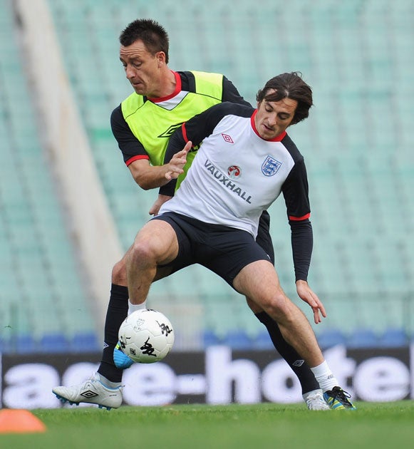 Leighton Baines pictured training with John Terry