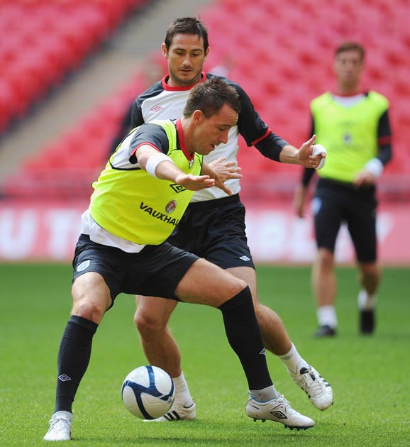 Lampard trains alongside his Chelsea team-mate John Terry