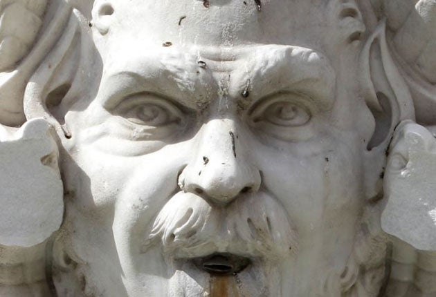 Two chunks of marble are missing from the statue in Rome's famed Piazza Navona