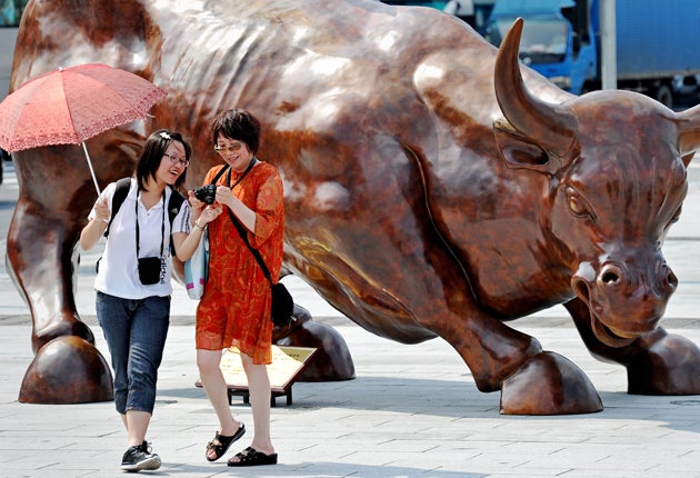 In bullish mood: New York's Financial District has seen a boom in tourism since 2001