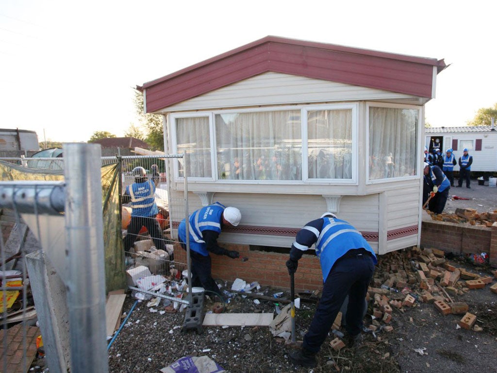 Bailiffs dismantle buildings on Dale Farm near Basildon last year