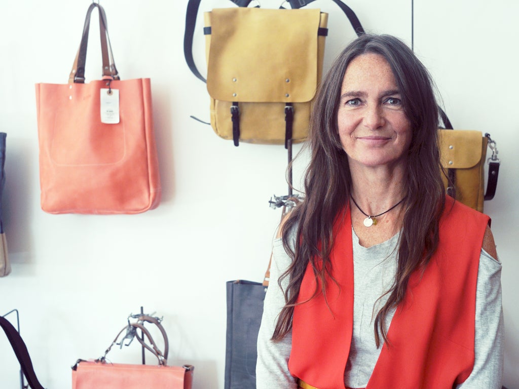 Bags of style: Ally Capellino in her newly opened west London store fitted out by interior designer Rupert Blanchard
