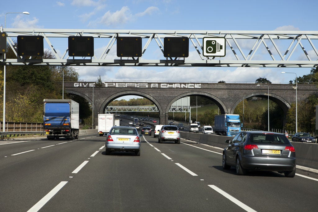 A man found cycling along the M25 motorway said he had been mistakenly directed there by a phone app, according to Surrey police.