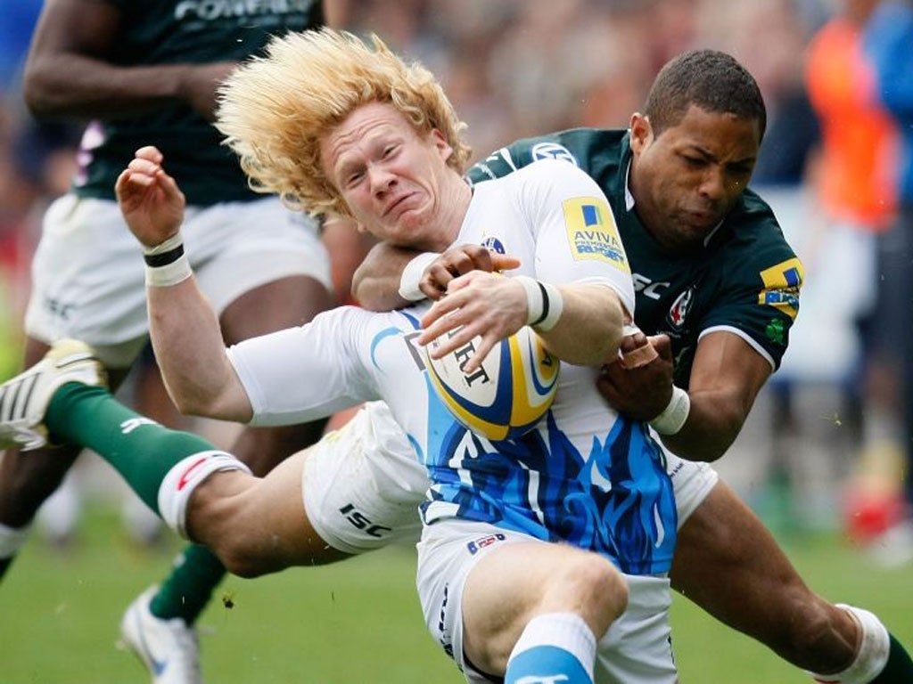 Irish's Delon Armitage tackles Bath's Tom Biggs around the neck on Saturday