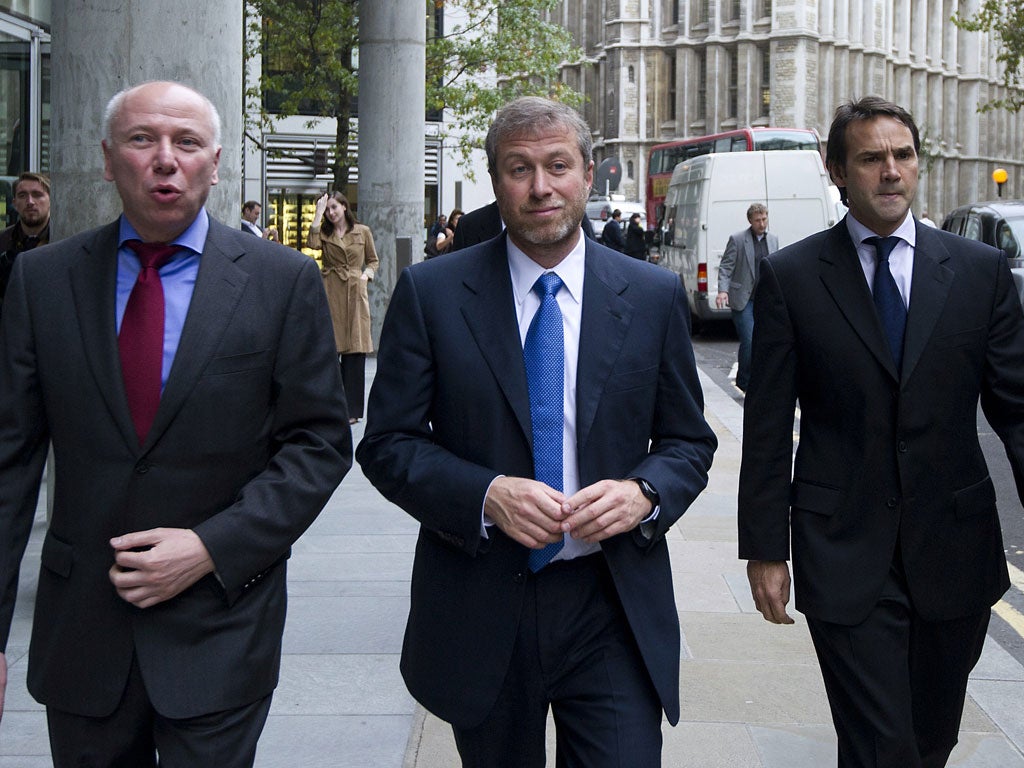 Roman Abramovich arrives at court yesterday with David Davidovich