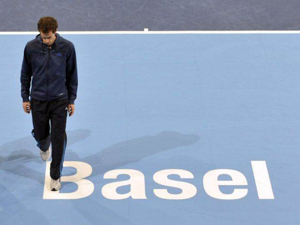 Andy Murray leaves the pitch of the Swiss Indoors tennis tournament