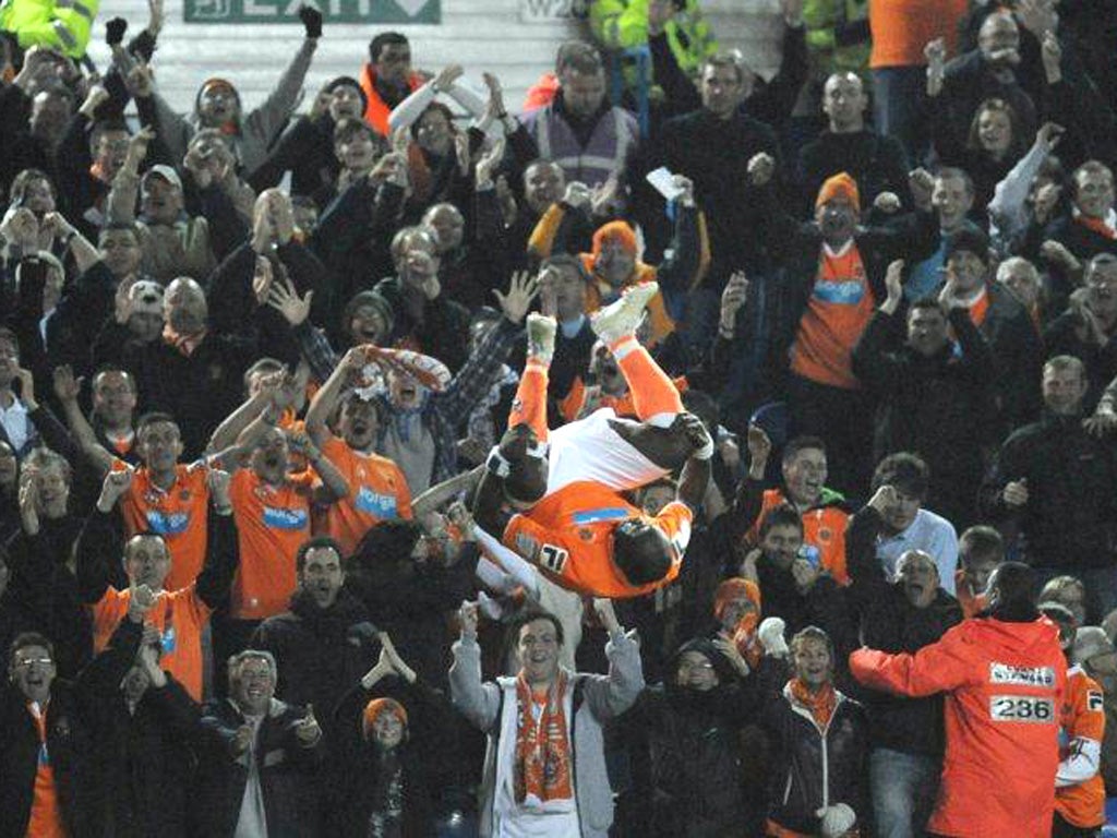 Lomana LuaLua performs his trademark somersault after helping Blackpool to a 5-0 win at Leeds