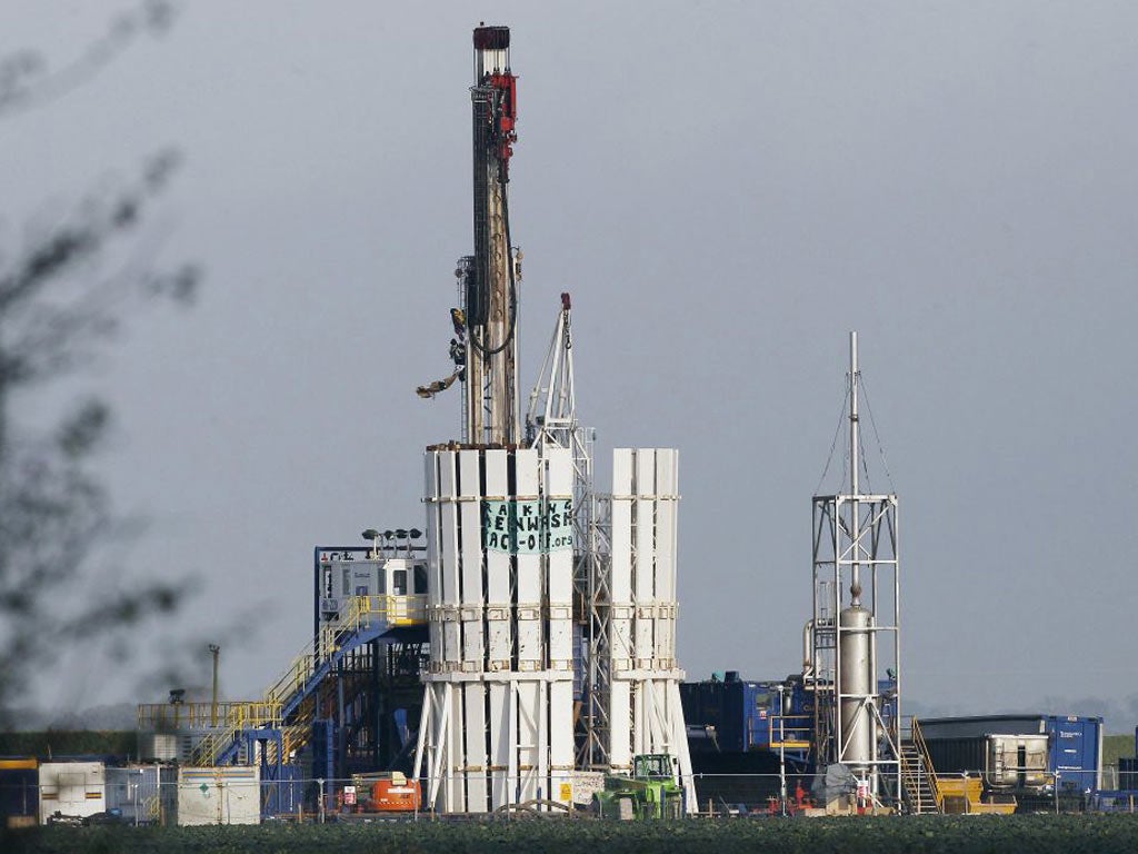 Protesters scale ashale gas rig at Banks, near Southport, yesterday, bringing a halt to work at the Cuadrilla site