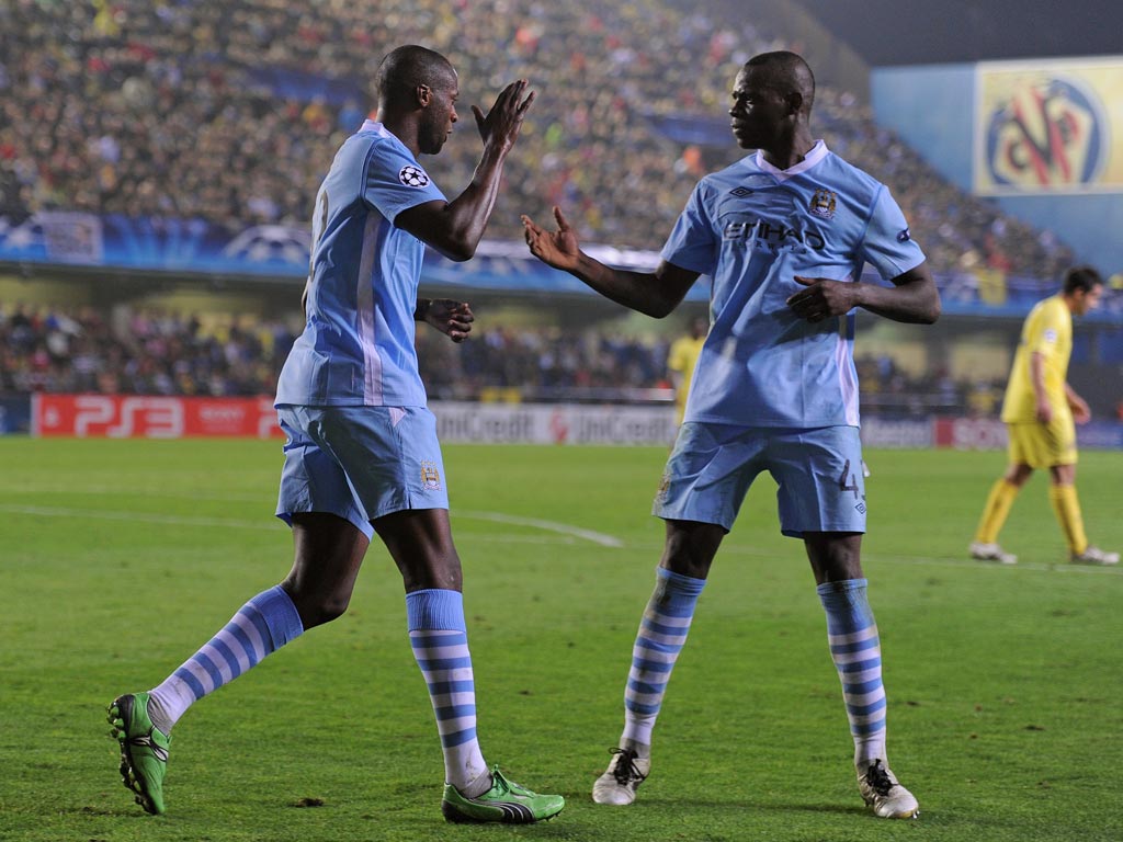 Yaya Toure scored twice with Mario Balotelli getting the other