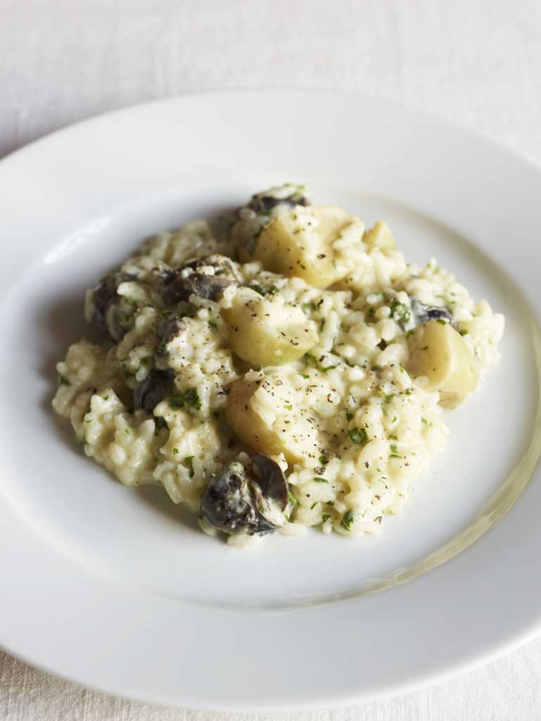 Snail, baked garlic and parsley risotto