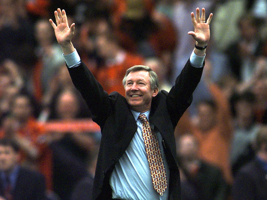 Alex Ferguson celebrates leading Manchester to the title at Old Trafford in 1999. Days later they had completed the Treble