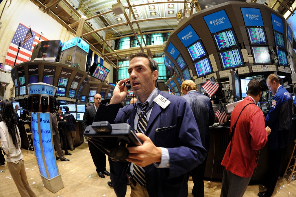 Traders working on the floor of the New York stock exchange