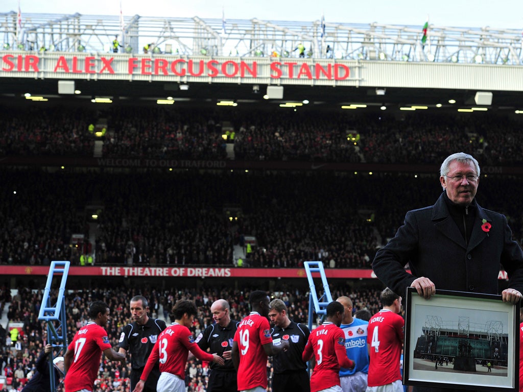 Stand by your man: United honour their manager before the game