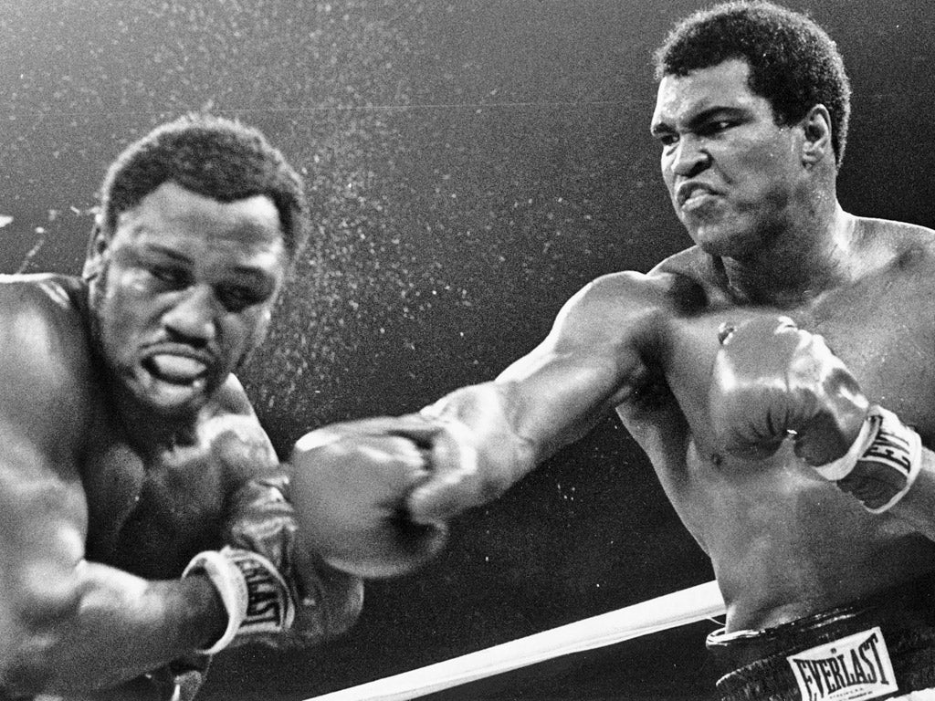 In their third clash, Muhammad Ali (right) secured a TKO to go 2-1 against Joe Frazier
