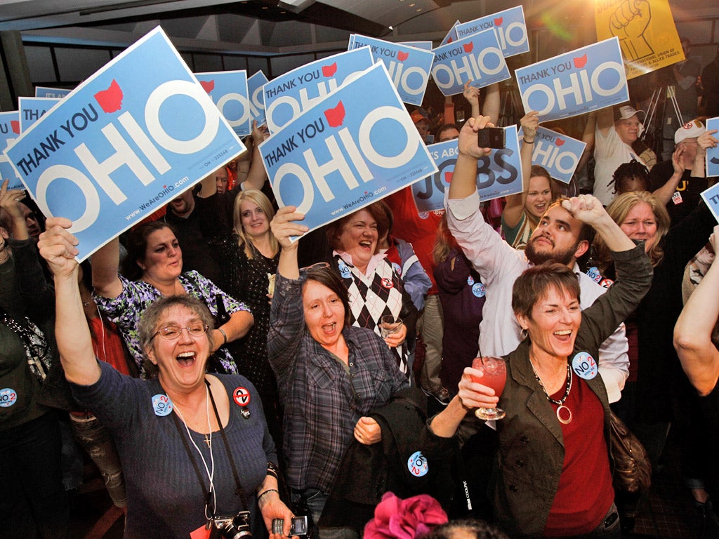 Opponents of the law, which would have curbed rights of public sector unions, celebrate in Cleveland, Ohio