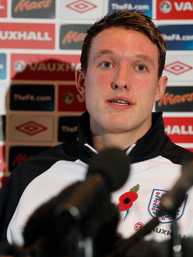 Phil Jones faces the media in Watford