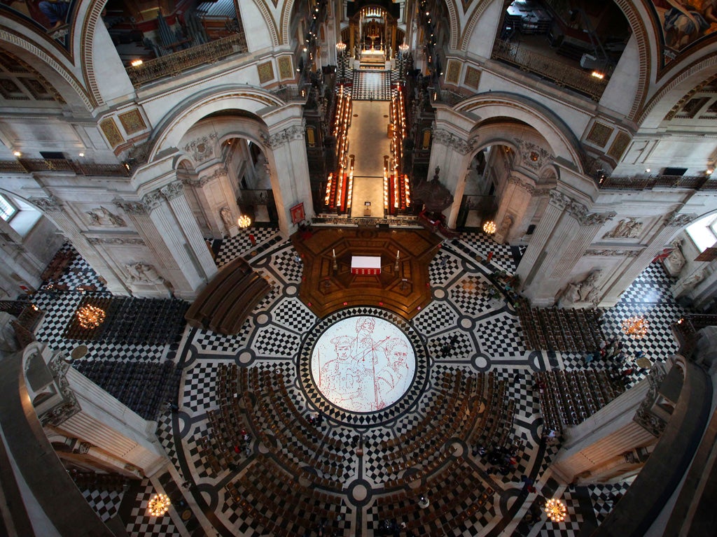 The installation at St Paul's Cathedral made from poppies depicting three child soldiers