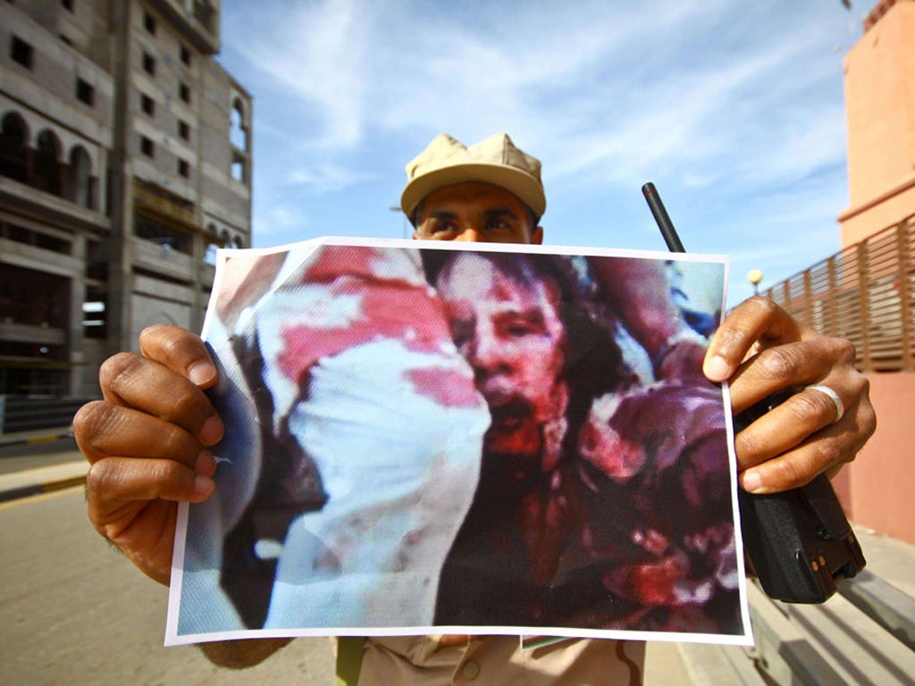 According to one new theory, Muammar Gaddafi was not overthrown because he was a crazed brutal dictator; he was ousted and killed because he was plotting to introduce a new Africa-wide trading currency to threaten the dollar. There are also conspiracies which claim his death photographs are faked