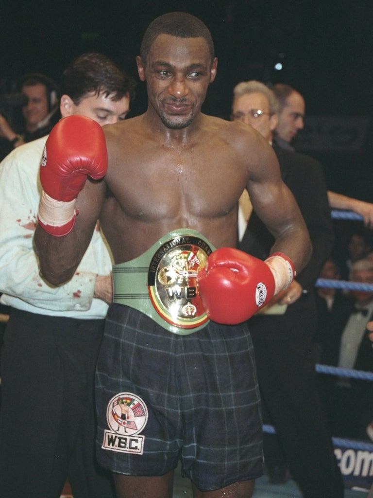 Graham receives the WBC Belt after winning the Super Middleweight Championship bout against Vinny Pazienza in 1997