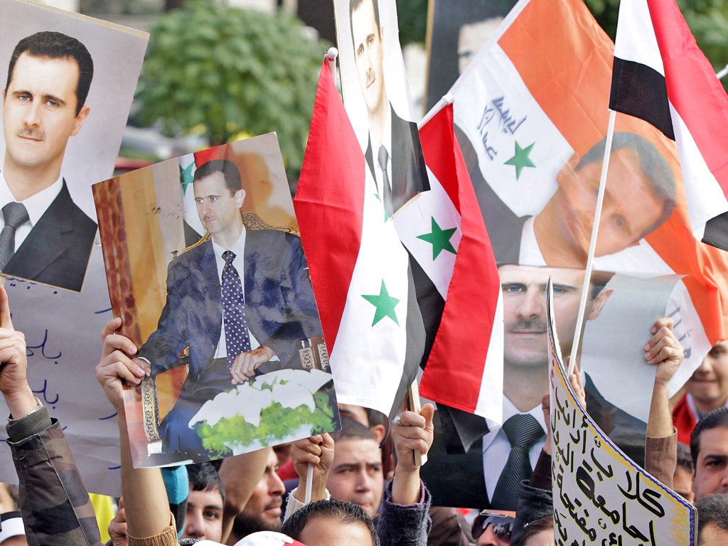 Supporters of President Bashar al-Assad in Damascus