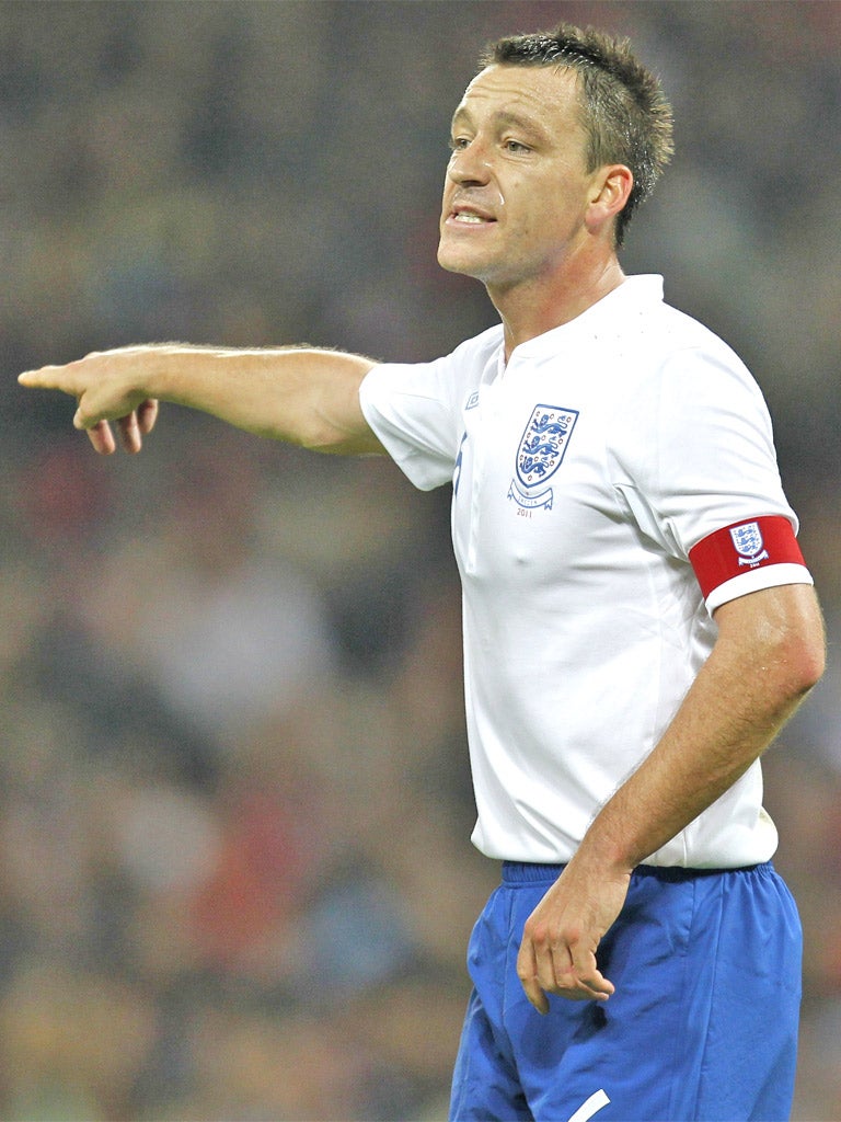 Captain John Terry directs his team-mates at Wembley last night