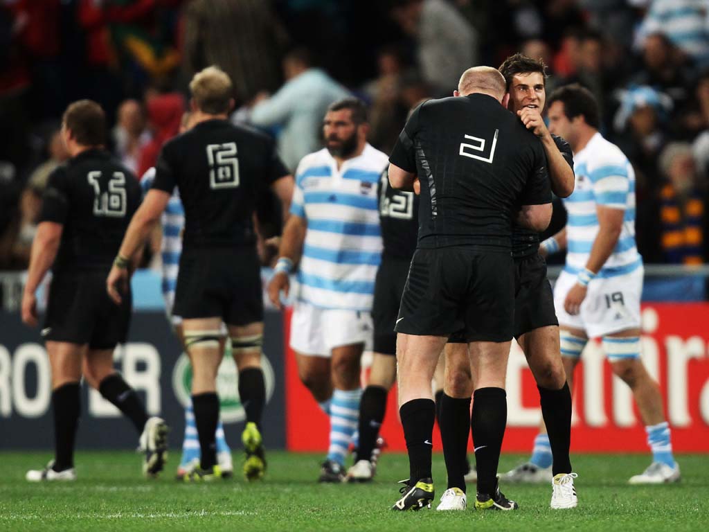 SEPTEMBER 12: England are warned by World Cup organisers to find a way to prevent numbers coming off players' jerseys. The numbers began to rub off England's black change shirts - themselves the subject of heated debate because of their similarity to New Zealand's All Black strip - during their opening win over Argentina.