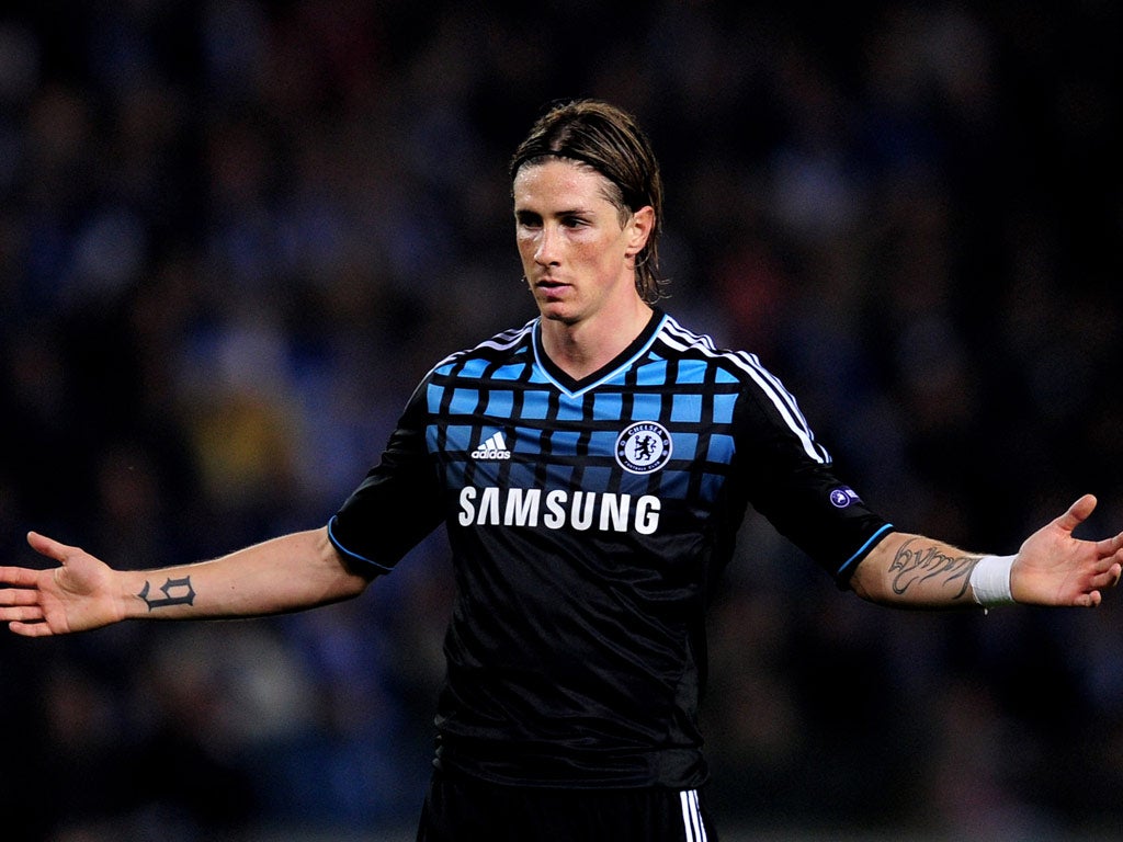 Chelsea striker Fernando Torres comes up against his former club