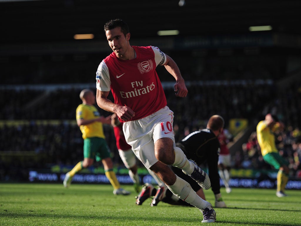 Robin Van Persie of Arsenal celebrates