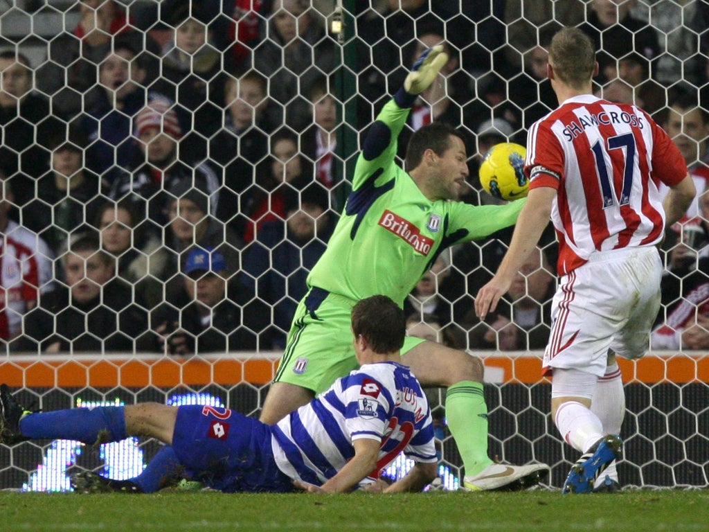 A grounded Heidar Helguson scores Queens Park Rangers' third