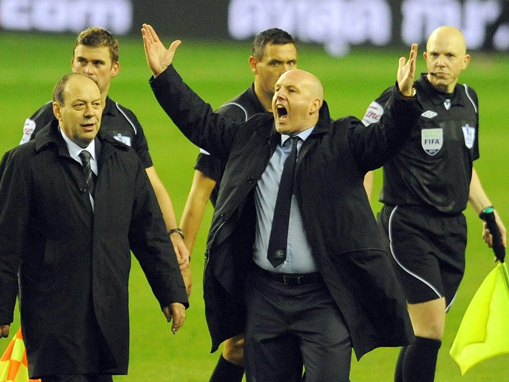 The Blackburn manager Steve Kean reacts to fans’ chants calling for his head after the final whistle