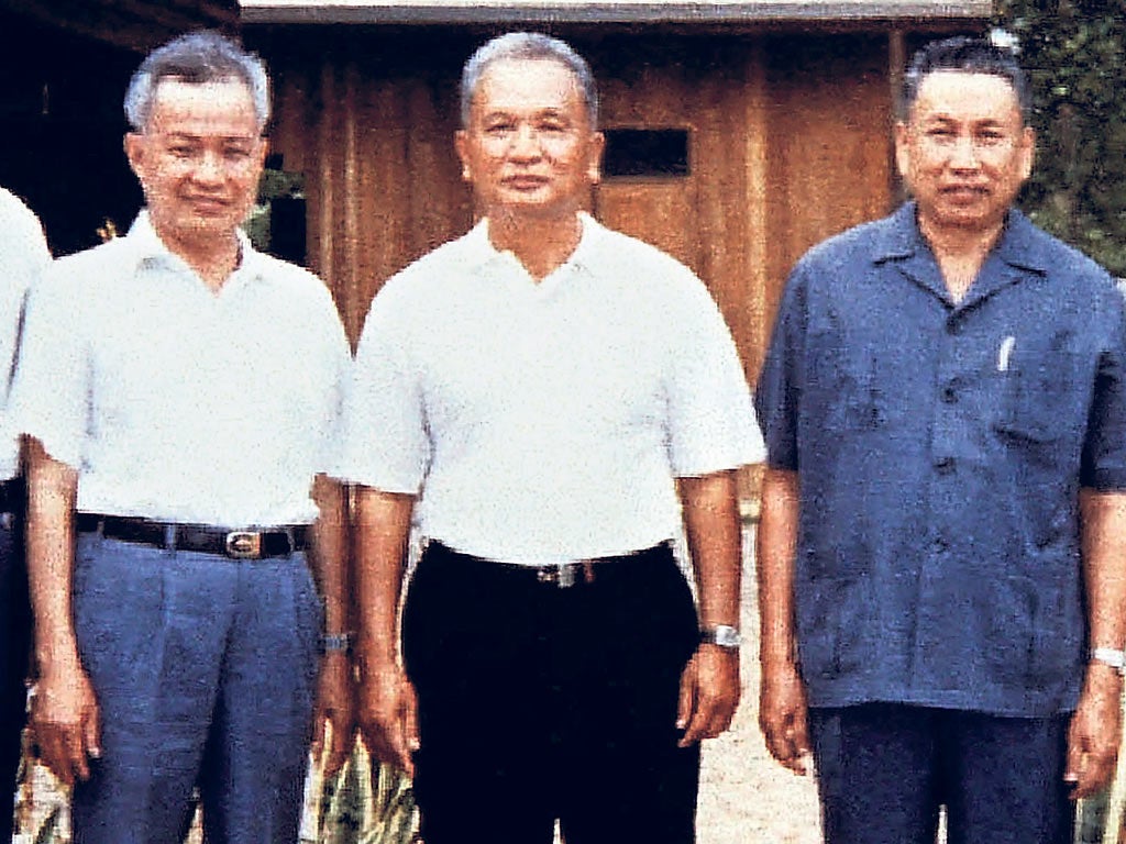 Pol Pot, right, at a camp in Cambodia in 1986